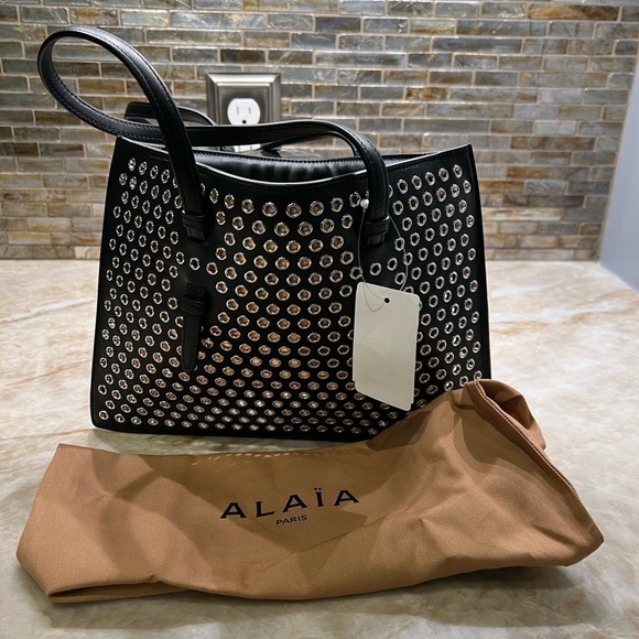ALAÏA Mina Small perforated leather tote bag - Picture 4 of 14